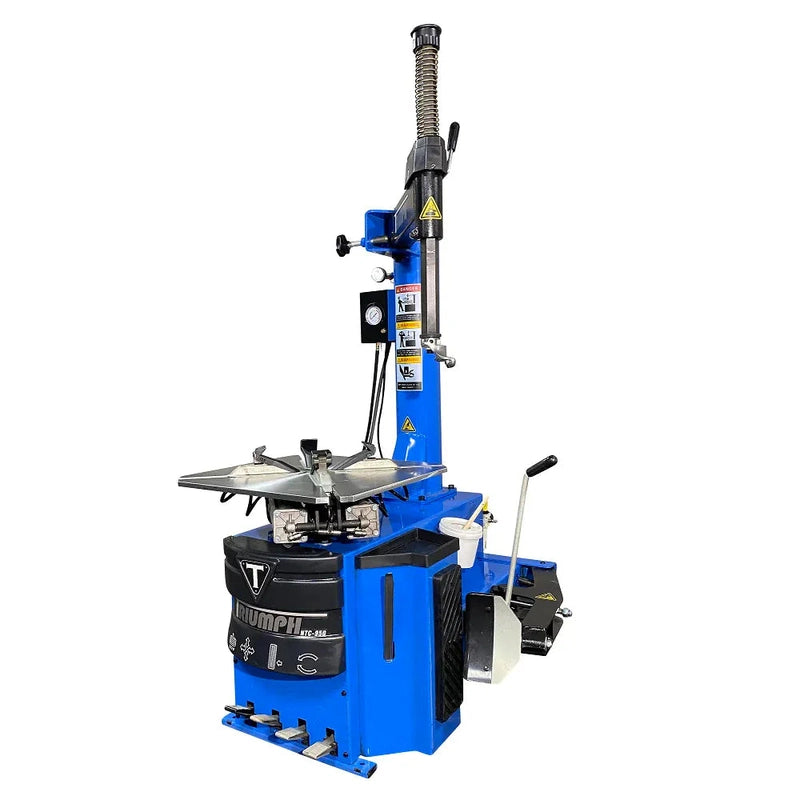 Triumph NTC-950 tire changer, angled view showing the side-mounted bead breaker