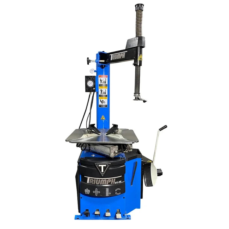 Triumph NTC-950 tire changer, front view with swing-arm mount head and four-jaw clamping turntable