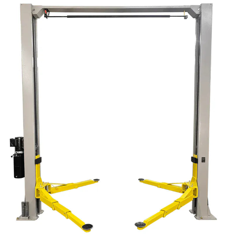 Triumph NTO-9AE 9,000 lb overhead two-post auto lift, front view with swing arms extended