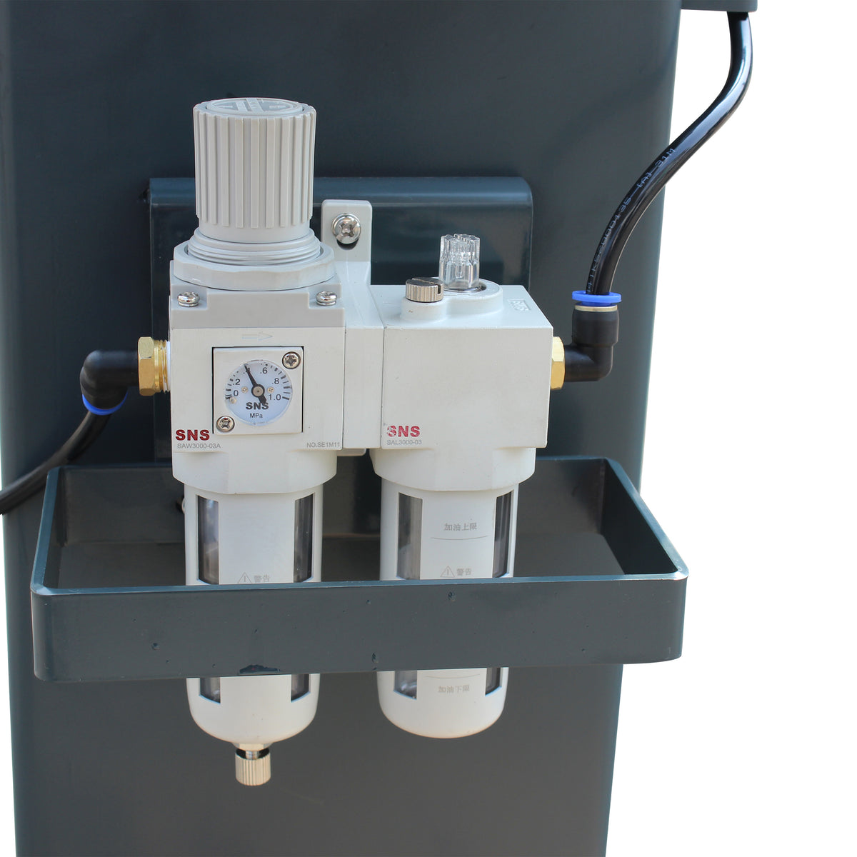 SNS air filter-regulator with pressure gauge and lubricator mounted on a lift post