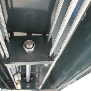 Underside view of the lift frame with steel lifting cables and a center mounting plate
