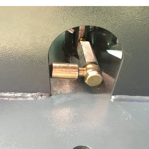 Close-up of a metal locking pin on the SAE-C14X