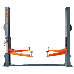 Stratus two-post lift front view with 10,000 lb capacity badge and floor-plate base