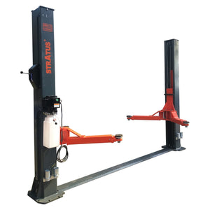 Full view of the Stratus two-post floor plate lift with power unit and one arm extended