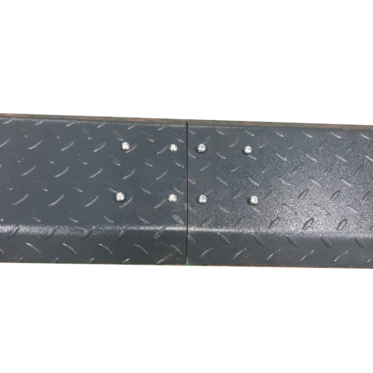Diamond-plate steel floor-plate sections bolted together at the base