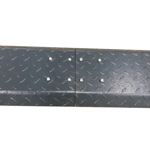 Diamond-plate steel floor-plate sections bolted together at the base