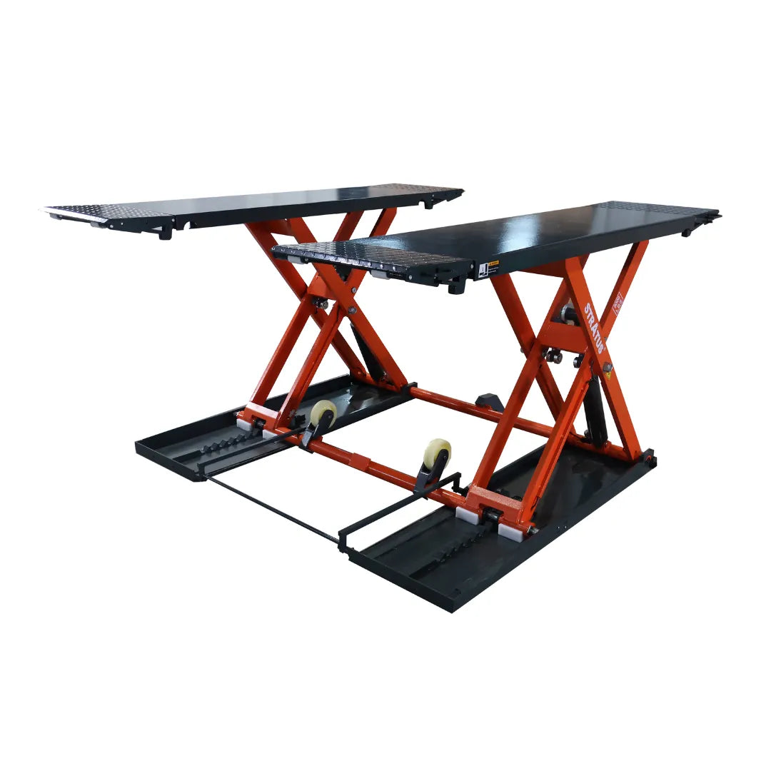 Stratus SAE-MS9000XT raised at a three-quarter angle, showing the open-center twin runways and rolling base