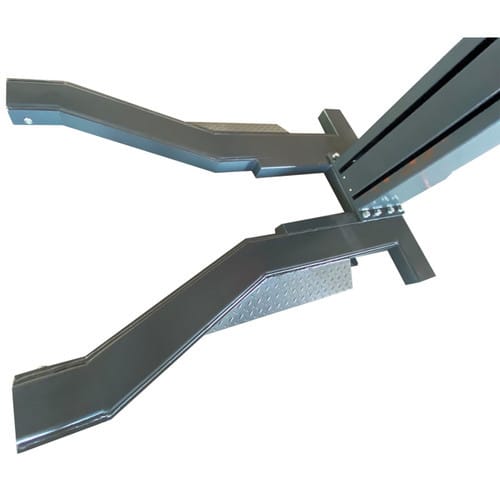 Black outrigger base legs with diamond-plate door-protection pads at the column