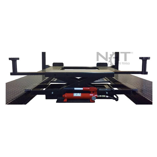 Triumph SJ-35 sliding bridge jack mounted across four-post lift runways with red hydraulic hand pump