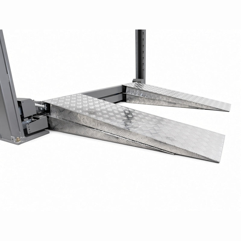 Aluminum approach ramps attached to the lowered runway