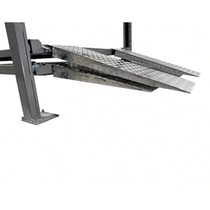 Aluminum checker-plate ramps at the elevated runway edge