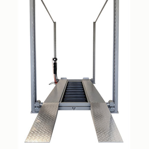 Front drive-on view with ramps, air hose and control pendant on the center column