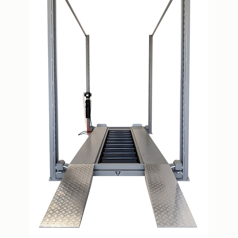 Front drive-on view with ramps, air hose and control pendant on the center column