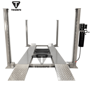 Triumph NSS-8 4-post lift front view with aluminum approach ramps deployed and steel jack tray on runways