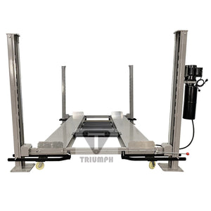 Triumph NSS-8 grey four-post storage lift raised on aluminum runways with a column-mounted power unit