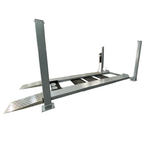Triumph NSS-8 X1 four-post lift elevated 3/4 view showing diamond-plate runways and drip trays