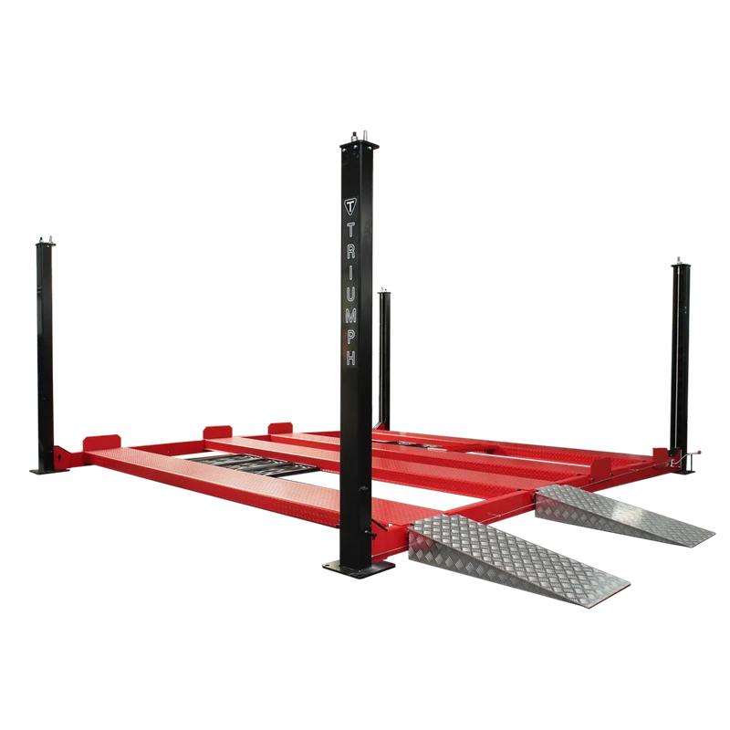 Four-post lift deck with two red diamond-plate runway lanes and two silver drive-on approach ramps