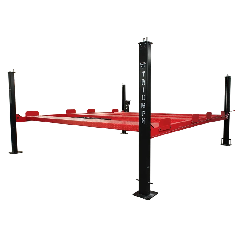 Triumph NSS9000 double-wide four-post storage lift, lowered, branded black columns and red diamond-plate runways