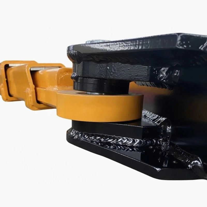 Close-up of the welded steel cradle meeting a lift-arm contact pad