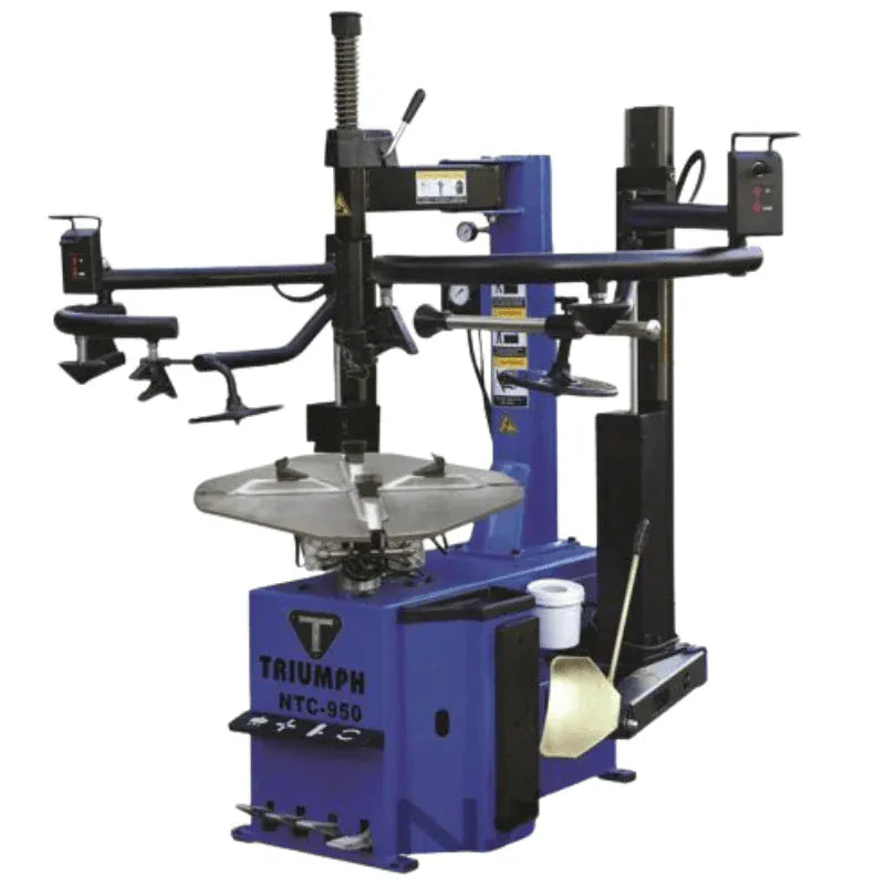 Triumph NTC-950-2 tire changer with dual pneumatic assist arms and mount/demount tower