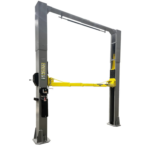 Triumph NTO-13A two-post overhead lift with gray columns, yellow arms and 13,000 lb capacity decal