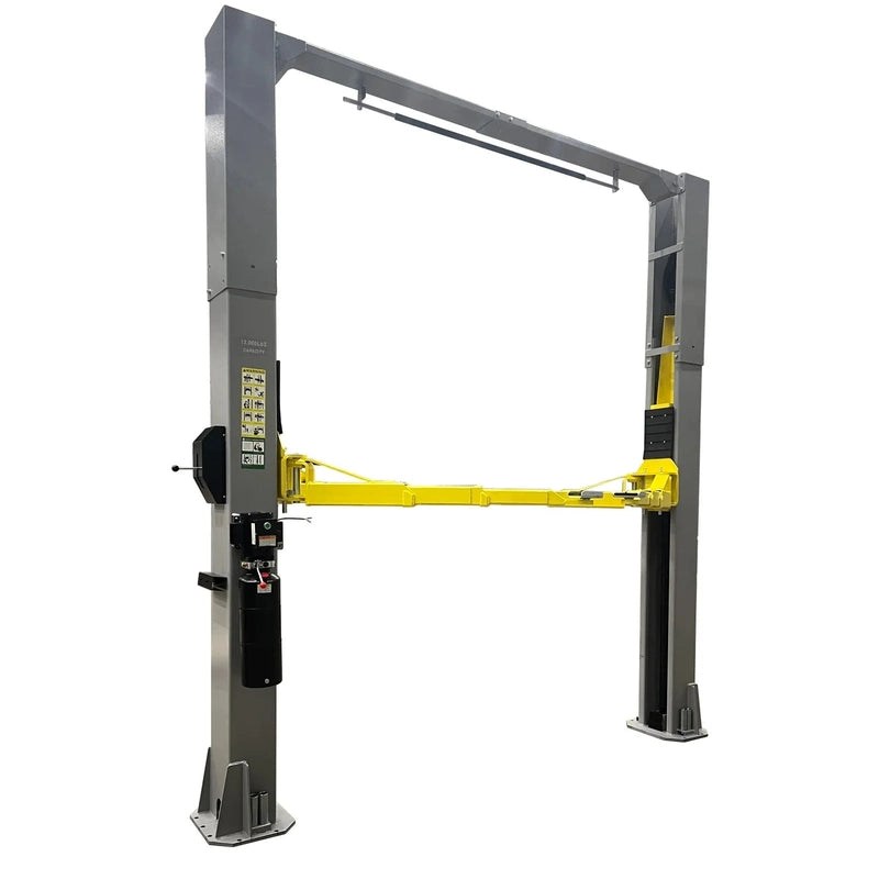 Triumph NTO-13A two-post overhead lift with gray columns, yellow arms and 13,000 lb capacity decal