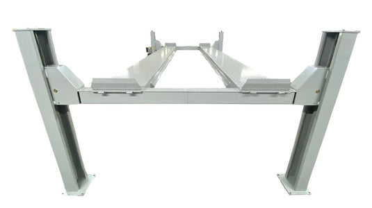Triumph NTR-16 four-post lift, front view of both front columns with center cross-beam between runways visible