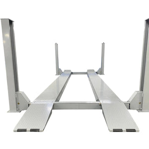 Triumph NTR-16 four-post auto lift, front view, both runways and approach ramps deployed