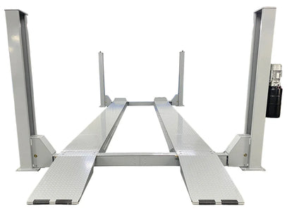Triumph NTR-32 four-post auto lift, front view of drive-on runways and four columns
