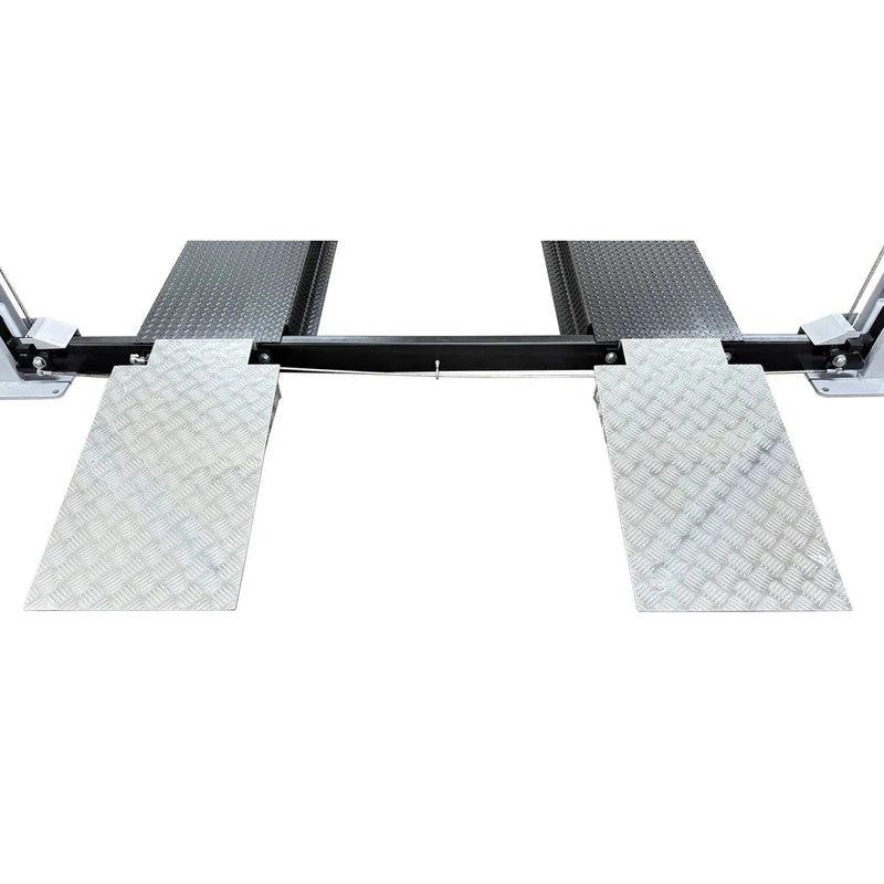 Close-up of the USA8000XLT rear drive-on aluminum approach ramps and base plates