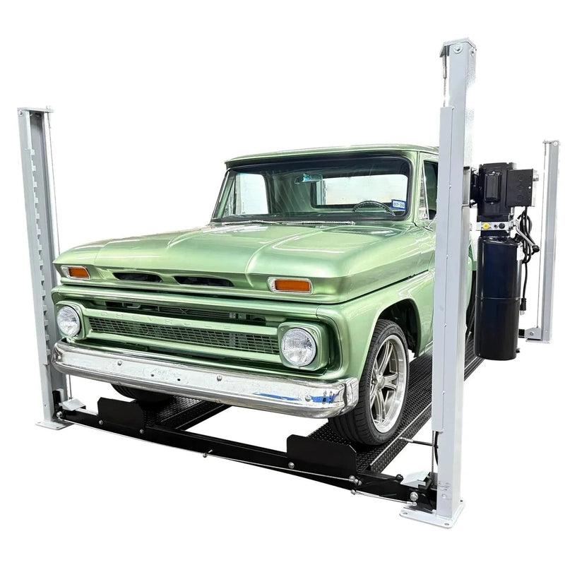 Front view of the USA8000XLT at low height with a green classic Chevrolet pickup on the runways