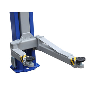 Carriage with two arms angled, spin-up pads and stackable adapter sleeves